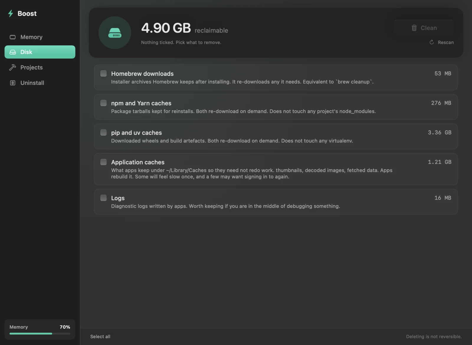 Boost's Disk tab, listing reclaimable caches with an explanation of what each one is and nothing ticked by default